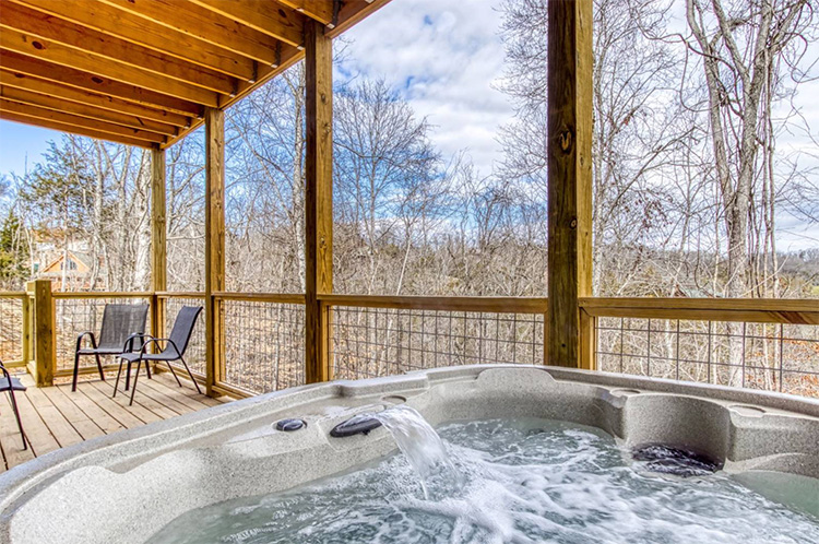 Hot tub in a log cabin managed by iTrip Smoky Mountains in Gatlinburg, Tennessee