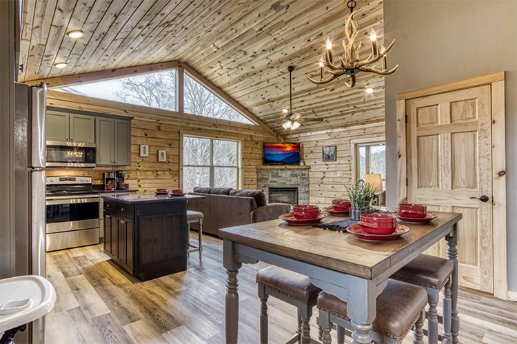 Living room in a log cabin managed by iTrip Smoky Mountains in Gatlinburg, Tennessee